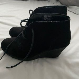 Women’s black suede wedge booties